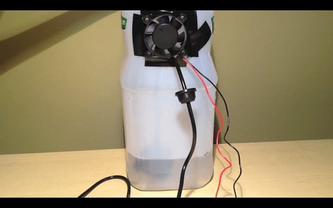 Close-up view of the homemade humidifier using an ultrasonic mist maker module.